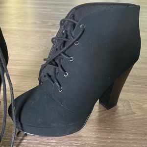 Heeled lace up booties